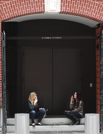 Cigarette break, West 43rd Street