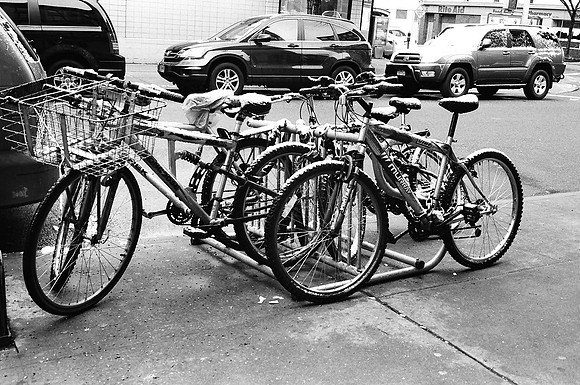 Bicycles dusted with snow