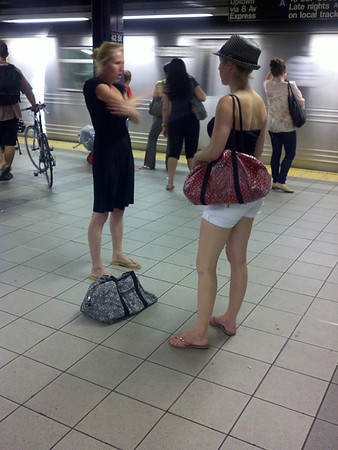 Demonstrating dance moves, 42nd St. 8th Avenue subway platform