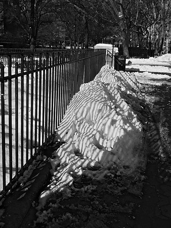 Fence, snow, slush