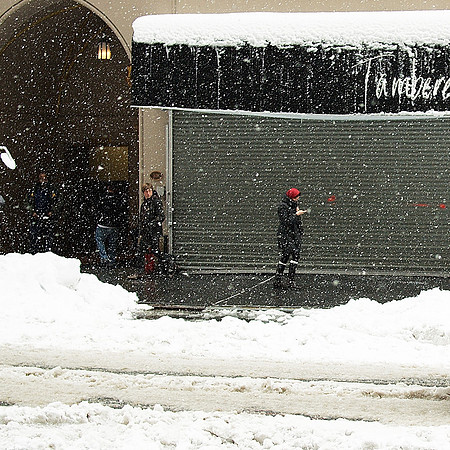 snow, roll-down gate, pedestrians
