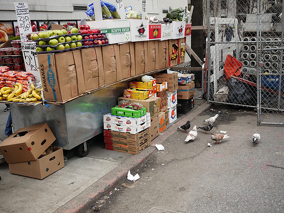 Fruit stand, pigeons, East 86th Street