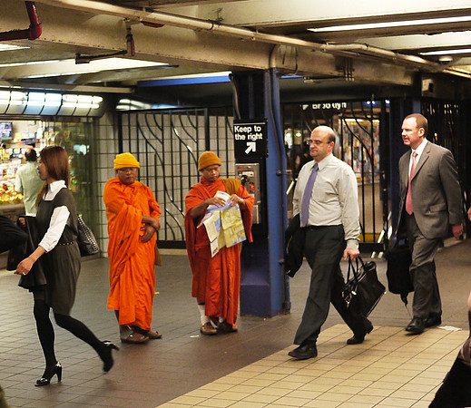 Checking directions, 42nd Street 8th Avenue subway station